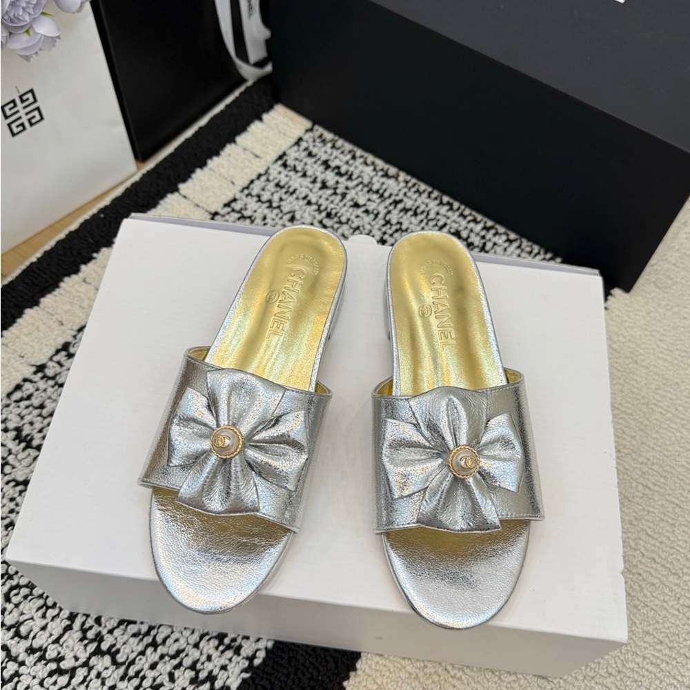 Authentic Chanel Shimmer Silver Bow Flat Slides with Box
